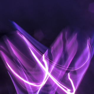 Abstract image of purple light paths with a dark purple background